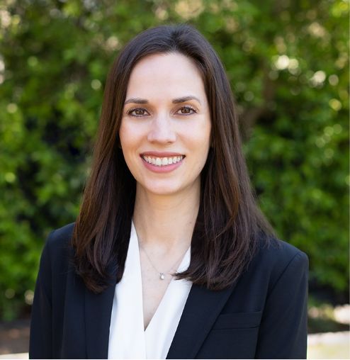 Kristin Molano in business attire