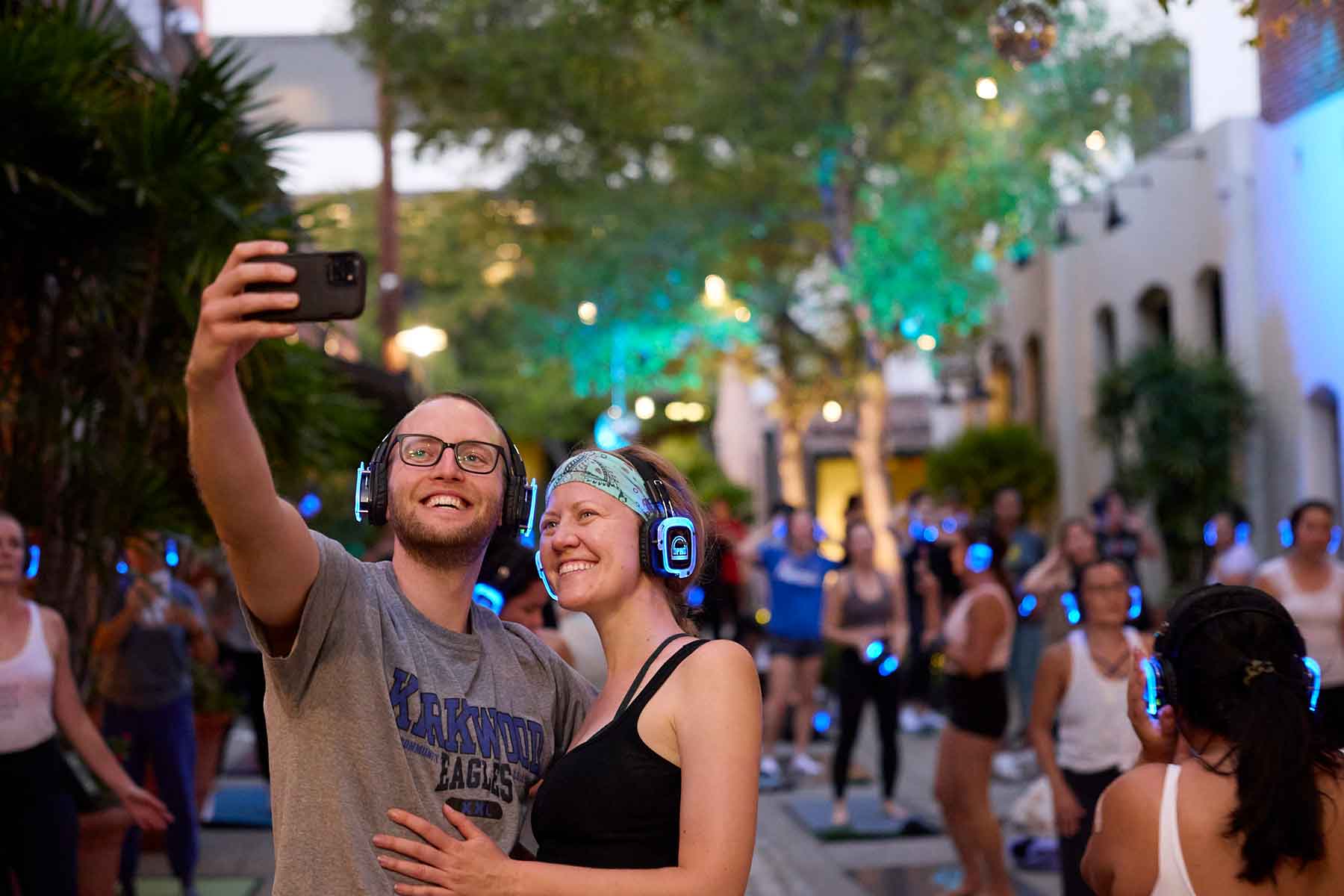 People taking a selfie at a silent disco