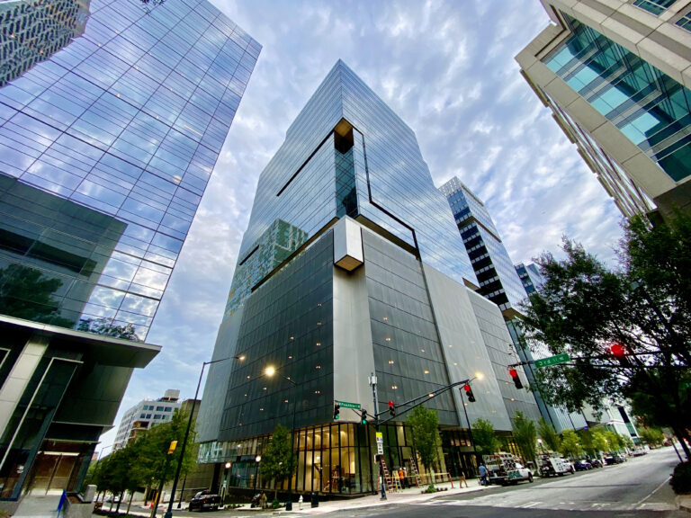 Modern skyscrapers under a cloudy sky