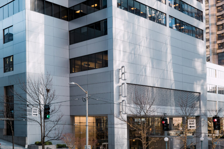 Modern building with reflective facade.