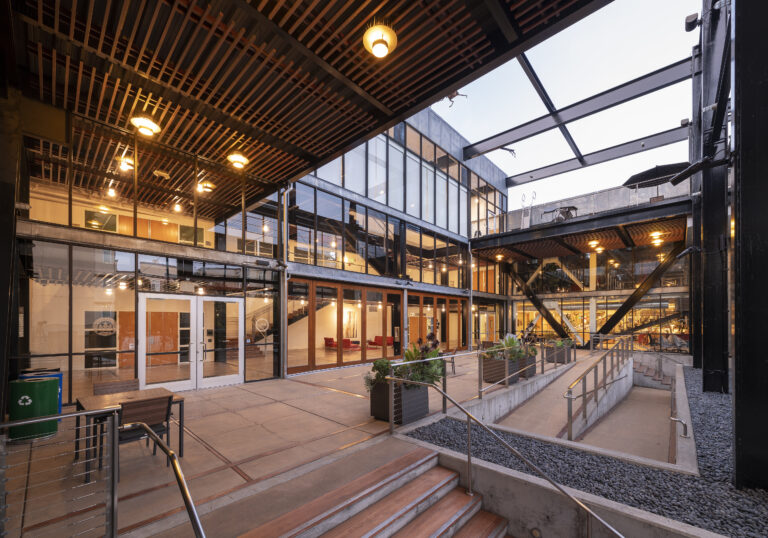 Modern outdoor seating area with lights
