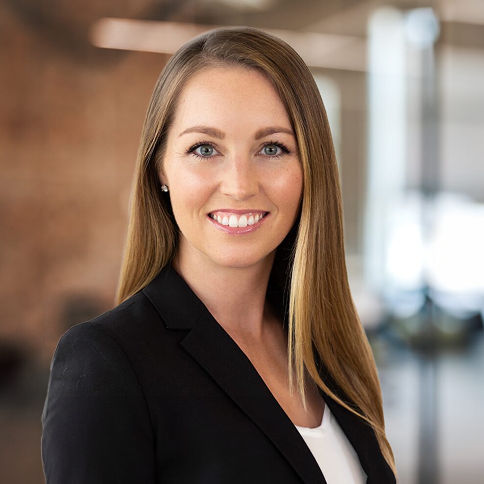 Professional woman in business attire.